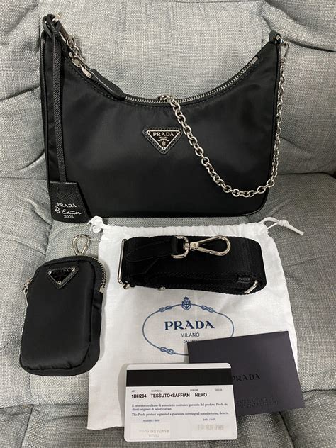 prada hobo re edition black cross body bag|Prada handbags sale.